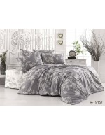 Постель двуспальная серого цвета с листьями на ветвях