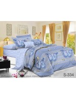 Постель двуспальная синего цвета с бабочками