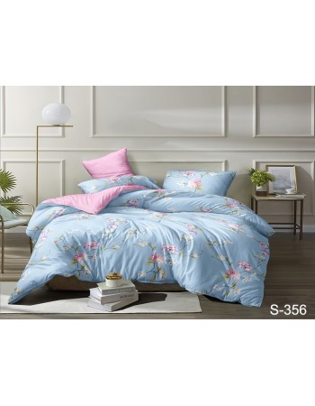 Постель двуспальная голубого цвета с цветами