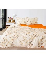 Постіль євро молочно-жовтогарячого кольору з гілками